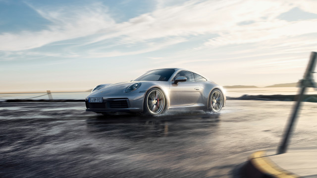 Silver sports car ocean road free wallpaper for desktop - medium preview image