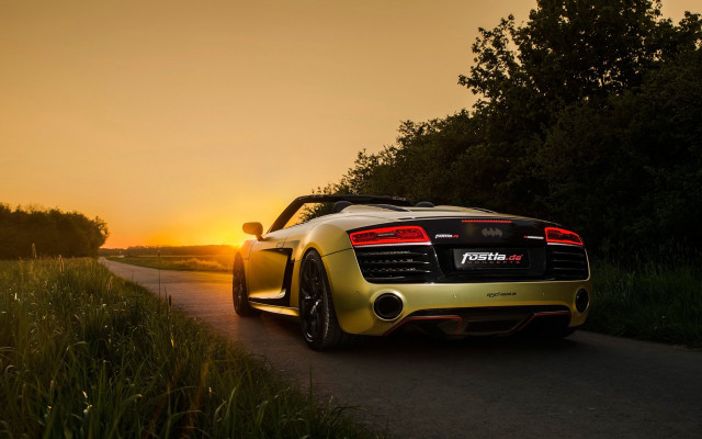 Yellow sports car backlit sunset free wallpaper for desktop - medium preview image