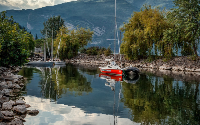 Calm river mountain boat reflections free wallpaper for desktop - medium preview image