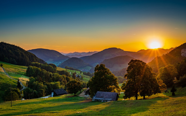 Sunset green valley village mountains free wallpaper for desktop - medium preview image