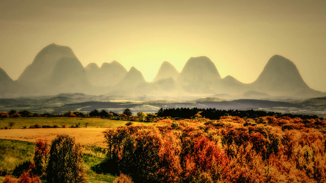 Mountains trees yellow sky dusk free wallpaper for desktop - medium preview image