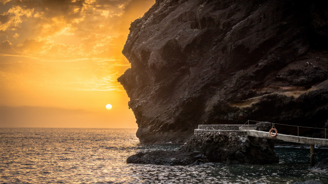 Ocean dock sunset mountain city free wallpaper for desktop - medium preview image