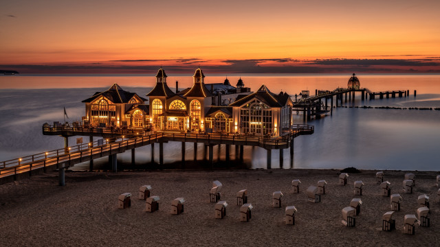Pier building night lights romanticism free wallpaper for desktop - medium preview image