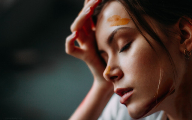 Woman closed eyes yellow cheek free wallpaper for desktop - medium preview image