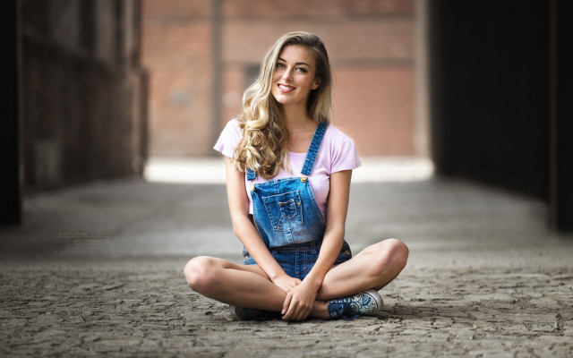 Woman sitting jeans pink shirt free wallpaper for desktop - medium preview image