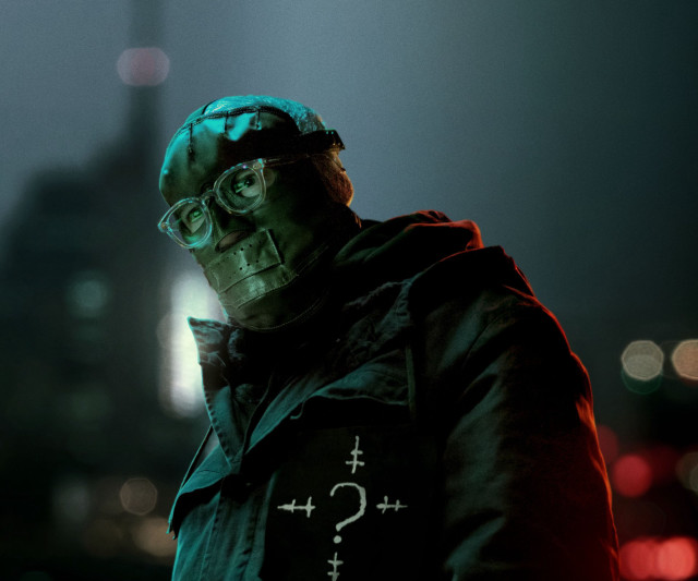 Man green hoodie glasses city free wallpaper for desktop - medium preview image