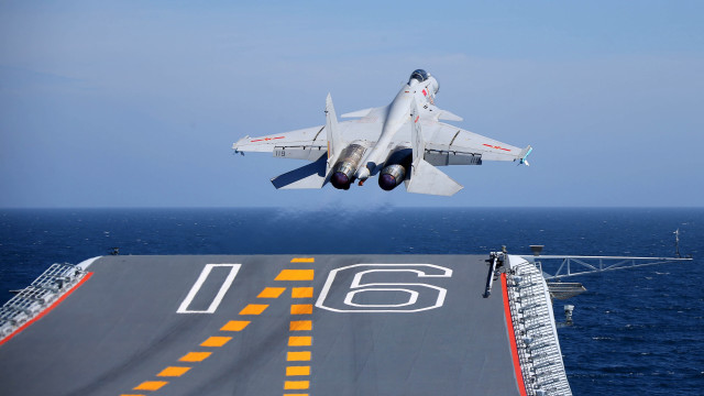 Fighterjet ship ocean man deck free wallpaper for desktop - medium preview image