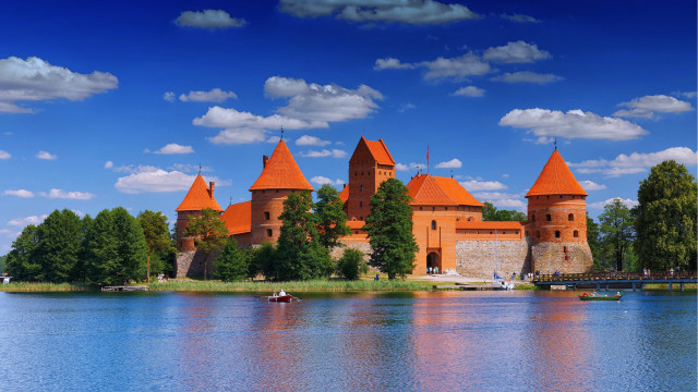 Castle lake boat orange turrets free wallpaper for desktop - medium preview image
