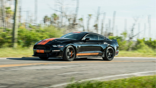 Black sports car driving forest #3 free wallpaper for desktop - medium preview image