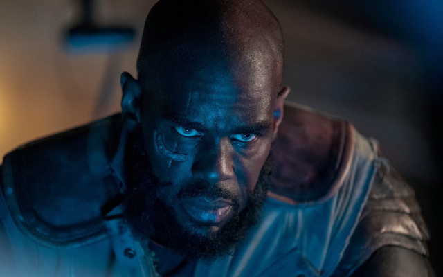 Bearded man leather jacket afrofuturism free wallpaper for desktop - medium preview image