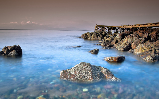 Pier rocky shore ocean blue free wallpaper for desktop - medium preview image