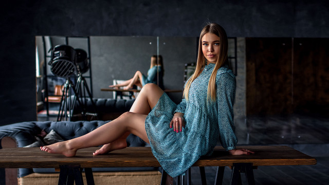 Woman blue dress sitting studio free wallpaper for desktop - medium preview image