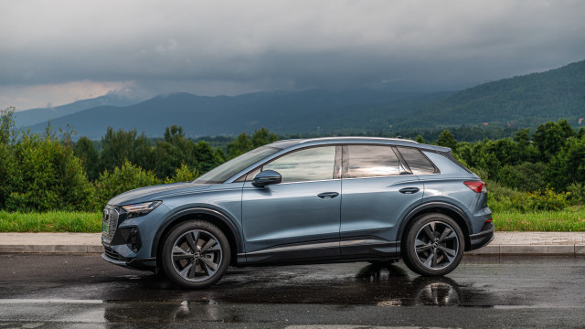 Blue car mountain road cloudy free wallpaper for desktop - medium preview image