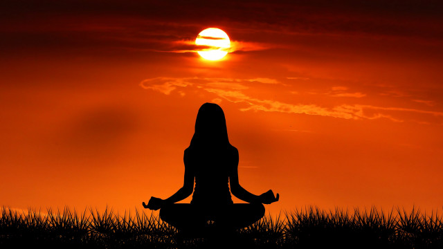 Woman sitting yoga sunset grass free wallpaper for desktop - medium preview image