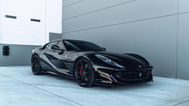 Black sports car building open free wallpaper for desktop - medium preview image