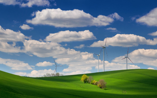 Green field wind turbines clouds free wallpaper for desktop - medium preview image