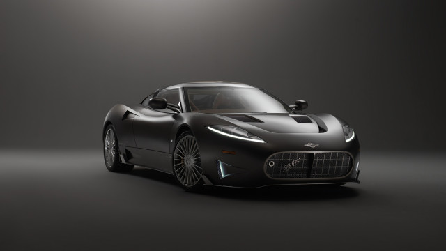 Black sports car studio photo free wallpaper for desktop - medium preview image