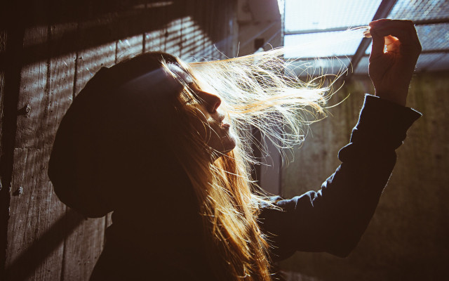Woman long hair brushing backlighting free wallpaper for desktop - medium preview image