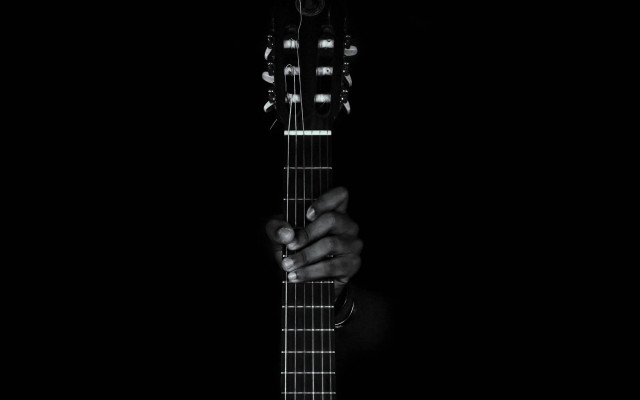 Person holding guitar dark black free wallpaper for desktop - medium preview image