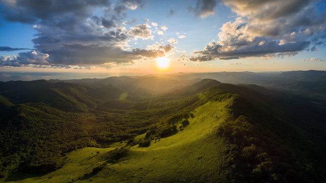 Mountain sunset ocean cityscape clouds free wallpaper for desktop - medium preview image