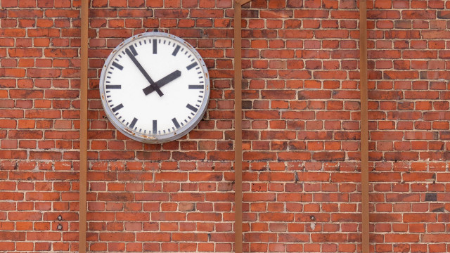 Clock brick wall window bars free wallpaper for desktop - medium preview image