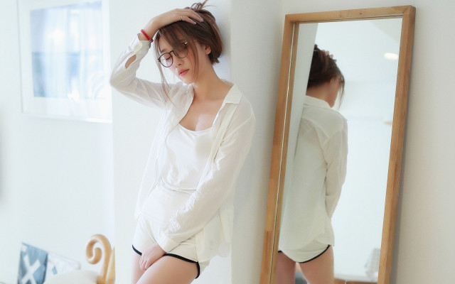 Woman white shirt black shorts free wallpaper for desktop - medium preview image