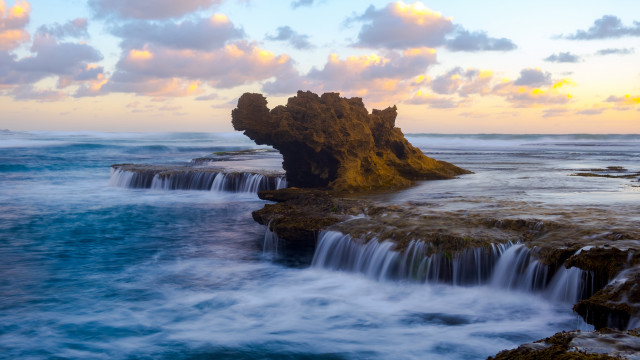 Waterfall ocean rocks cloudy sunset free wallpaper for desktop - medium preview image