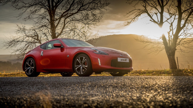 Red sports car mountain road #17 free wallpaper for desktop - medium preview image