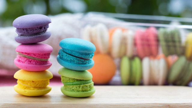 Colorful macaroons table blurry depth free wallpaper for desktop - medium preview image