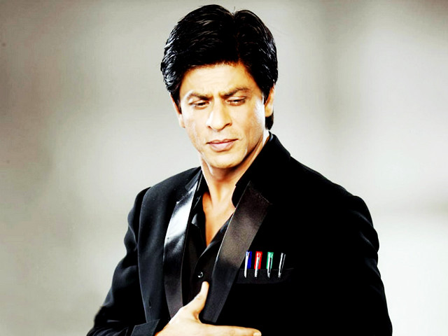 Man black suit tie holding free wallpaper for desktop - medium preview image