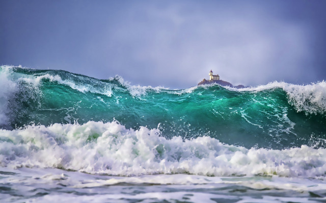 Lighthouse wave ocean stormy weather free wallpaper for desktop - medium preview image