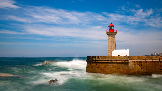 Lighthouse rock wall water blue free wallpaper for desktop - medium preview image