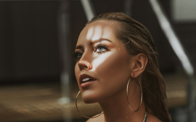 Woman earrings white dress blurry free wallpaper for desktop - medium preview image