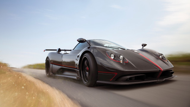 Black sports car road sky free wallpaper for desktop - medium preview image