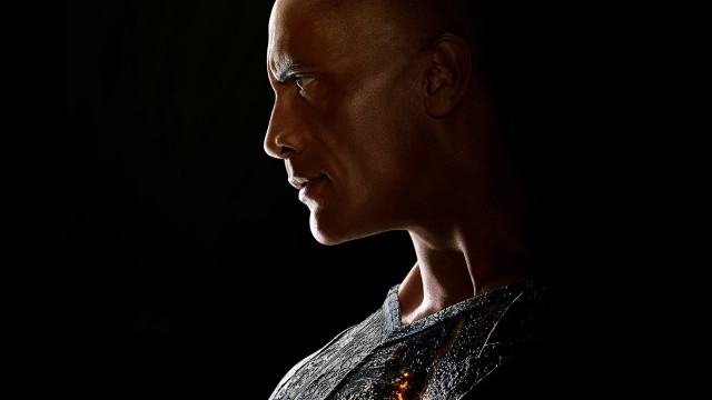 Bald man serious profile jewelry free wallpaper for desktop - medium preview image