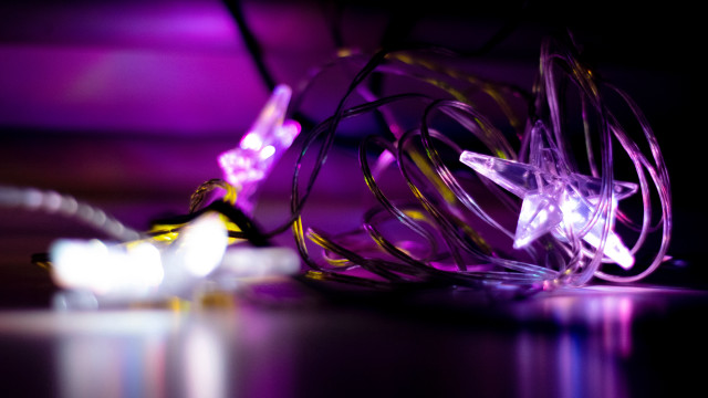Purple star light string glowing free wallpaper for desktop - medium preview image