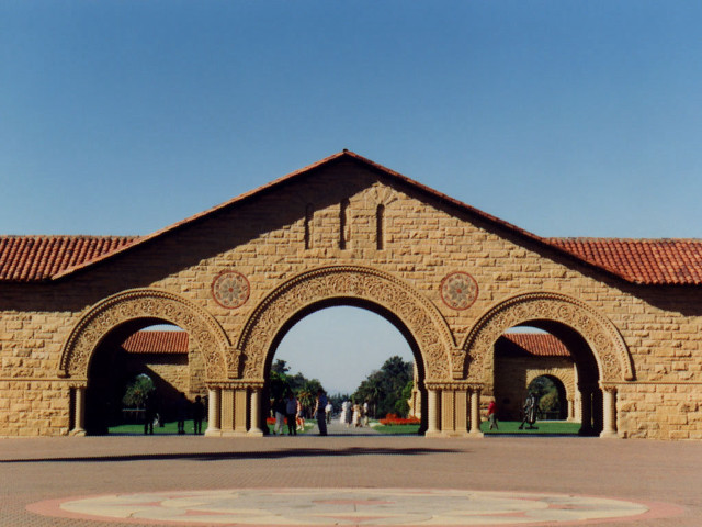 Large stone building clock circular free wallpaper for desktop - medium preview image
