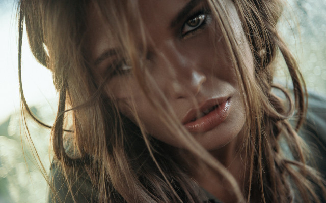 Woman blonde jacket serious portrait free wallpaper for desktop - medium preview image