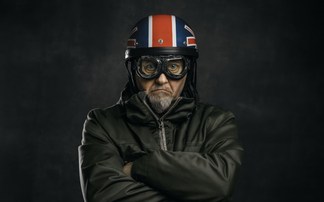 Man helmet glasses crossed arms free wallpaper for desktop - medium preview image
