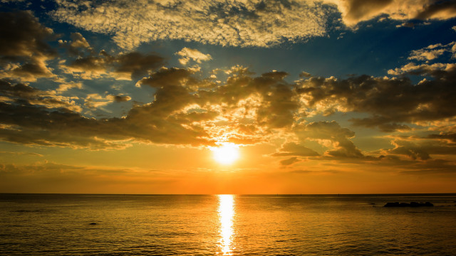 Sunset ocean boat clouds cityscape free wallpaper for desktop - medium preview image