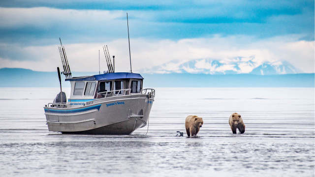Boat bears mountain cloudy sky free wallpaper for desktop - medium preview image