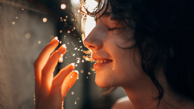 Woman blowing bubbles sunny outdoor free wallpaper for desktop - medium preview image