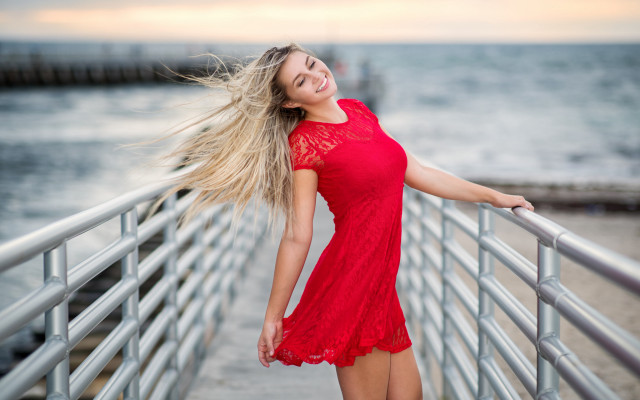Woman red dress water smiling free wallpaper for desktop - medium preview image
