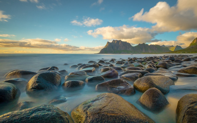 Rocky beach sunset mountains boat free wallpaper for desktop - medium preview image