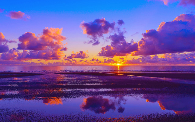 Sunset clouds reflecting water plane free wallpaper for desktop - medium preview image