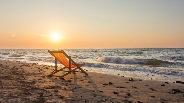 Beach chair sunset ocean sand free wallpaper for desktop - medium preview image