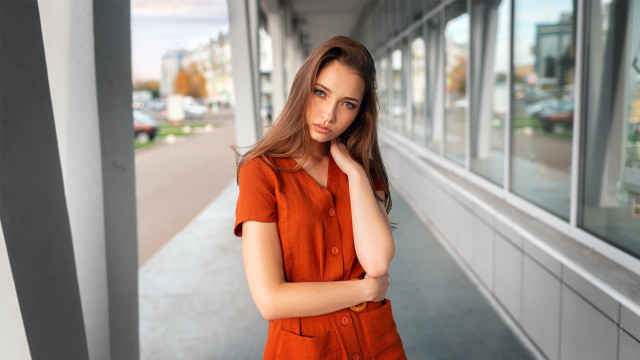 Orange shirt woman outdoor portrait free wallpaper for desktop - medium preview image