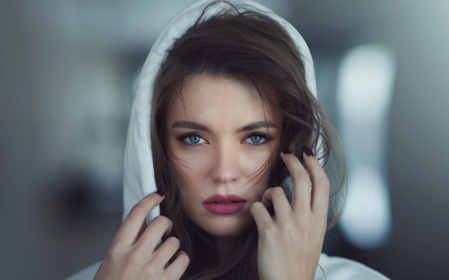 Woman hoodie serious blueeyes brownhair free wallpaper for desktop - medium preview image