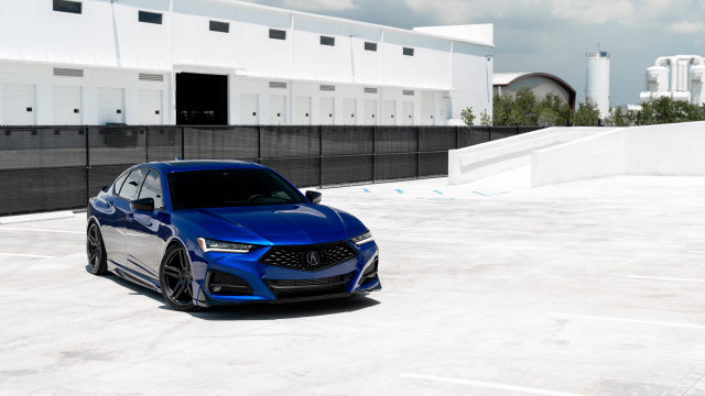 Blue car parking lot vroom free wallpaper for desktop - medium preview image