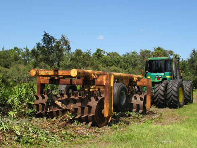 Tractor parked field plow attached free wallpaper for desktop - medium preview image